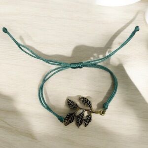 Knotted Bracelet with Golden Leaves
